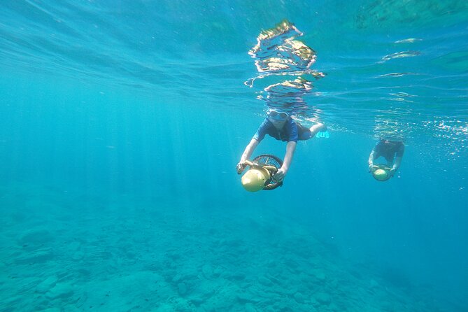 Snorkeling Tour with Sea Scooter in Heraklion - Following the guide or exploring at your own pace