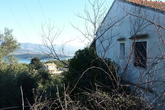 South to Northwest Corfu 4x4: Coastal Dreams &Village Charms - Loggas Beach delivers the dramatic coastal view