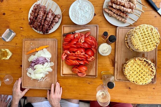 Souvlaki Cooking Class with Locals – Transfer Included - Grilling pork and chicken skewers