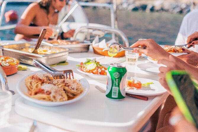 Sunset Caldera Sailing Cruise - Palea Kameni volcanic stop and hot-springs swimming time