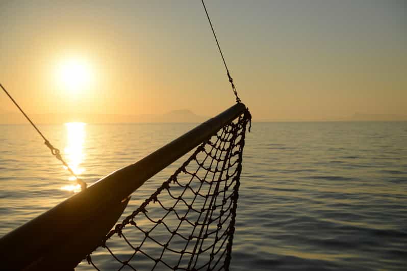 Sunset cruise at St. George Bay from Hersonissos port - Leaving Hersonissos port as daylight softens