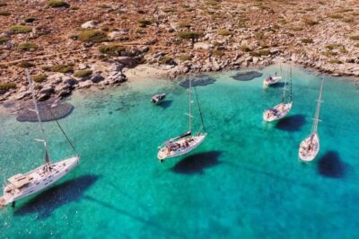 Sunset Cruise from Hersonissos port to St. Georgios bay - Swimming and SUP time at Agios Georgios Bay