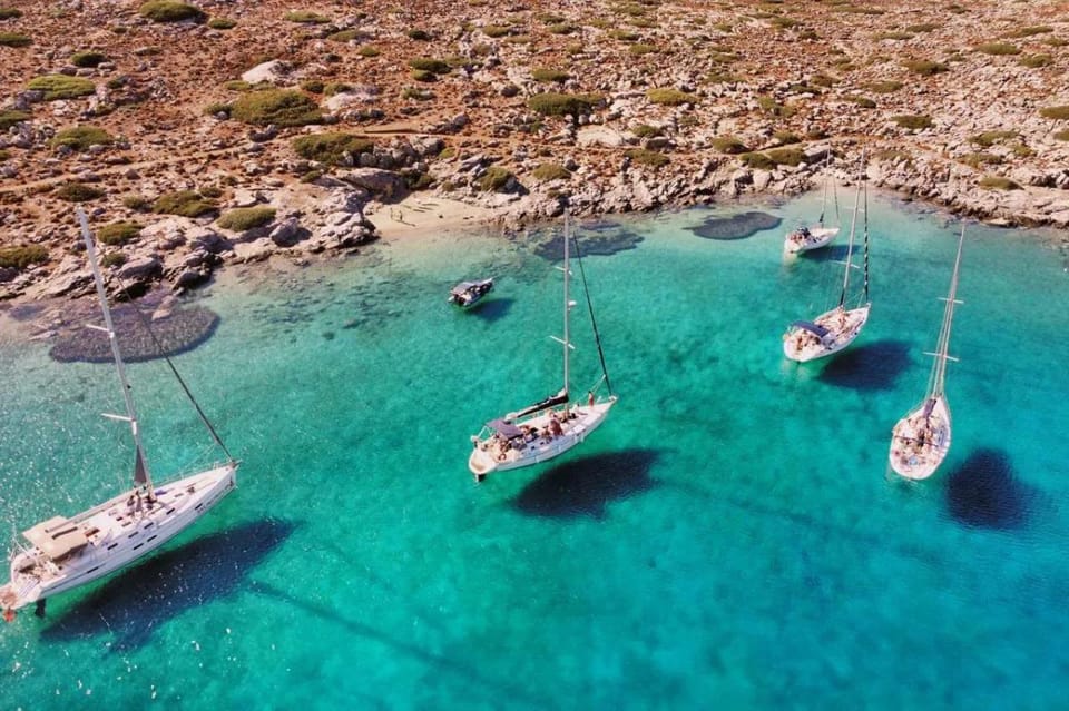 Sunset Cruise from Hersonissos port to St. Georgios bay - Swimming and SUP time at Agios Georgios Bay