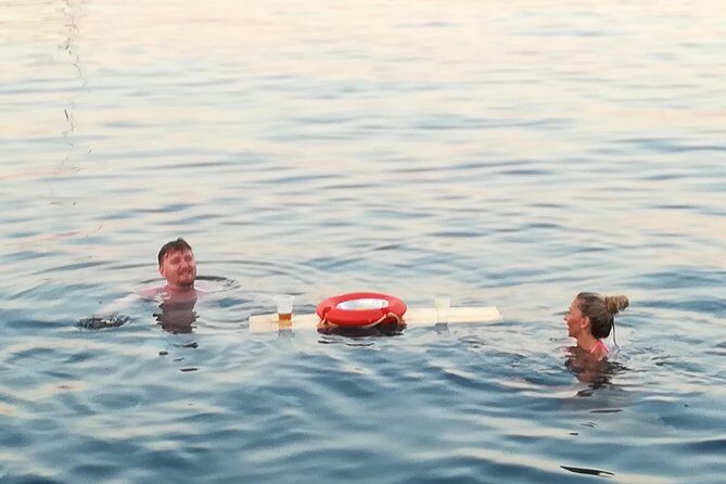 Sunset Cruise with a Swimming Stop at Kalithea Bay - Food, drinks, and live music: the onboard “hang” factor