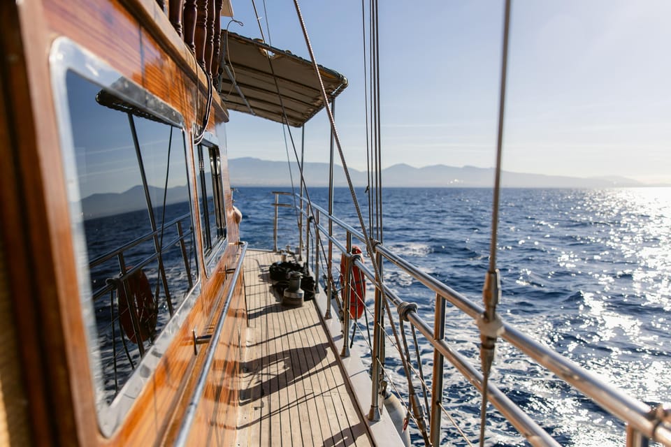 Sunset Dinner Cruise: Swim Stop, Drinks & Onboard Dining - Vouliagmeni and the sunset sail