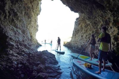 SUP tour in Sivota - Sea caves, turquoise water, and the coastal tunnel