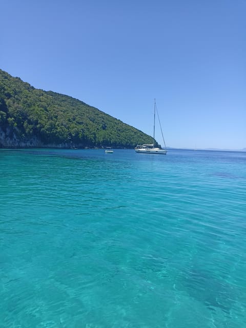 Syvota & Blue Lagoon cruise with BBQ and beach stop - Finding the boat at Garitsa Bay