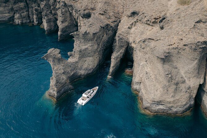 The Fastest Private Motor Yacht in Santorini - All Inclusive Tour - Oia Cliff and a Swim Under the Village
