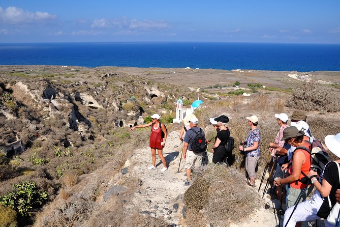 Thirassia Island: 6hr Private Tour with Lunch from Santorini - Lunch, churchyard setting, and priest-made wine