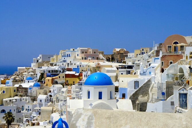 Top Spots Bus Tour in Santorini with Transportation - Walking Through Pyrgos Village