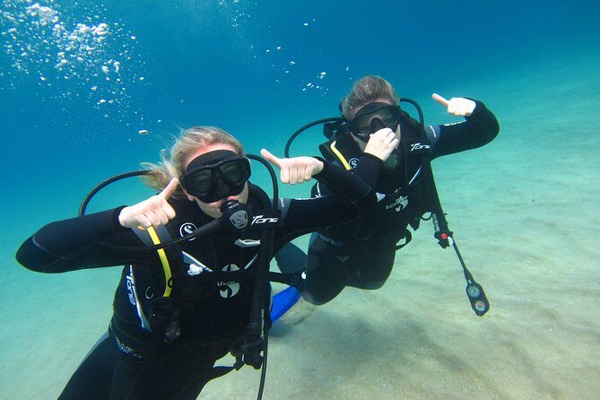 Try a DIVE, discover scuba diving in Mykonos - Underwater photos, bottled water, and DAN insurance: where the value lives