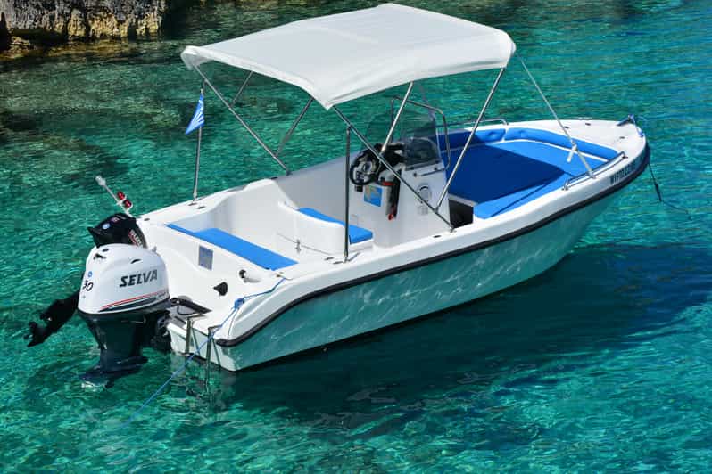 Tsilivi: Full Day Boat rental to Shipwreck & Blue Caves - Blue Caves: swim from the boat into the rock