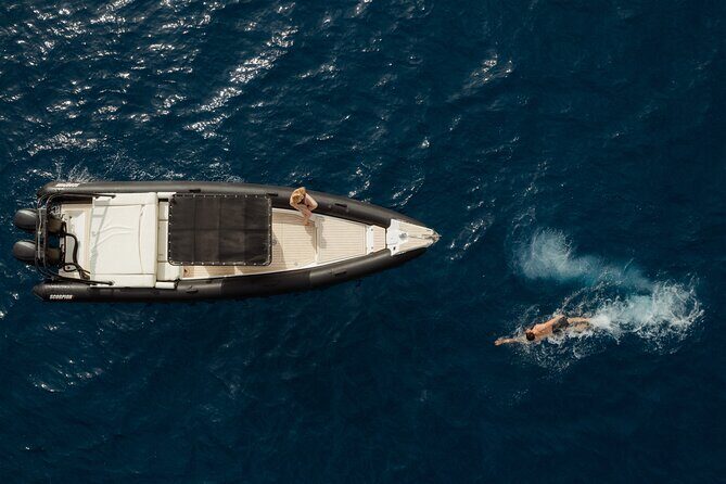 Unique Half-Day Private Motor Boat Cruise in Santorini - The Sunset Finale Under Oia With Local Wine or Champagne