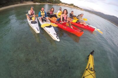 Vourvourou Sunset Sea Kayak Trip - Paddling across calm Vourvourou Bay
