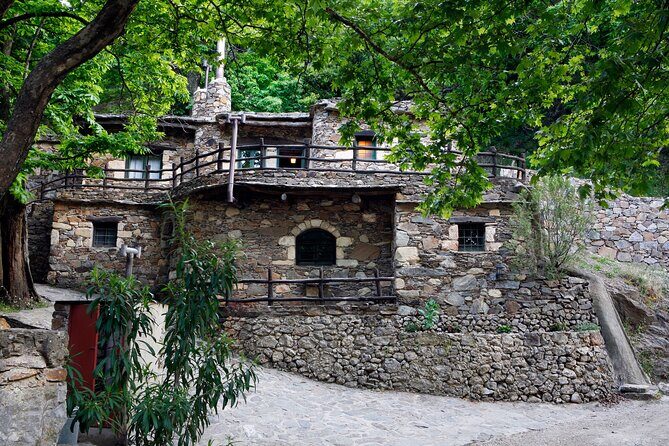 Wine & Olive Oil Tour with Lunch at Milia Mountain Retreat - Entering the Milia Mountain Retreat: Lunch in Off-Grid Stone Houses