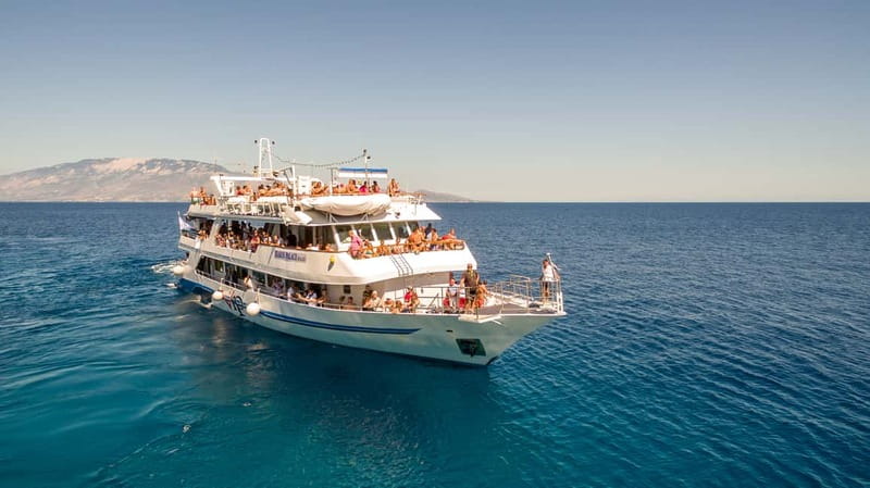 Zakynthos: Cruise to Navagio Shipwreck with swimming stops - Swimming through the Blue Caves