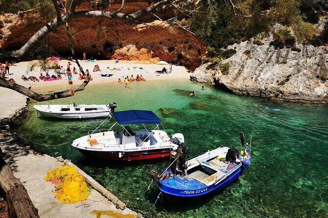 Zakynthos Early Morning Small Group Tour Shipwreck & Blue Caves - Poseidon-Style Rock Formation: Myth Meets Boat Positioning