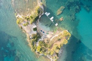Zakynthos: Glass Bottom Turtle Boat Tour to Keri Caves & Islands - Keri Caves swim stop: crystal water and your snorkel plan