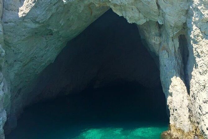 Zakynthos: Glass Bottom Turtle Boat Tour to Keri Caves & Islands - Marathonisi turtle beach time: fun swimming, but crowd reality
