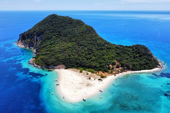 Zakynthos Half Day swimming tour to Turtle island and keri caves - Keri Caves swim: white cliffs, natural blue pool vibes