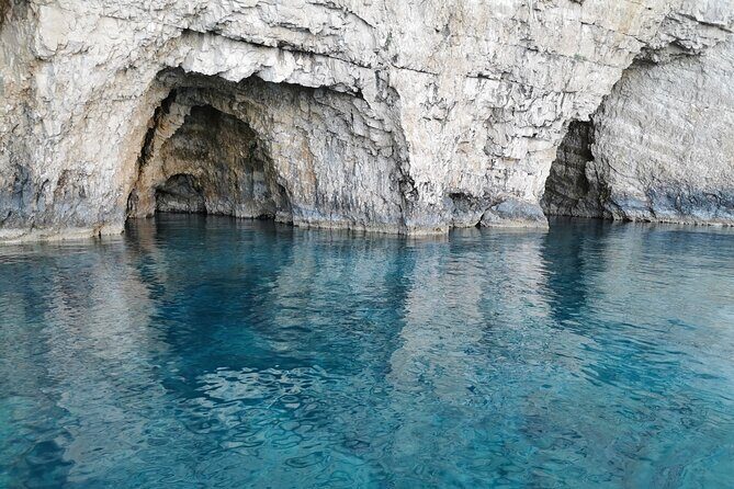 Zakynthos Half Day Tour to the Turtle Island, Cameo & Keri Caves - National Marine Park turtle spotting from a glass-bottom boat