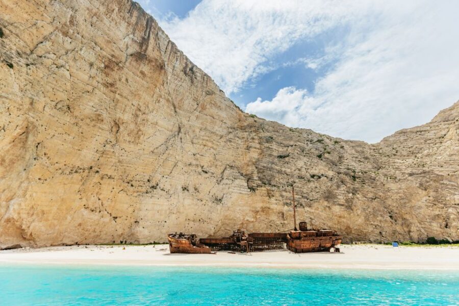 Zakynthos: Shipwreck Beach by Land & Sea Blue Caves Day Tour - Blue Caves by Speedboat: Electric Blue Views and Glass-Bottom Watching