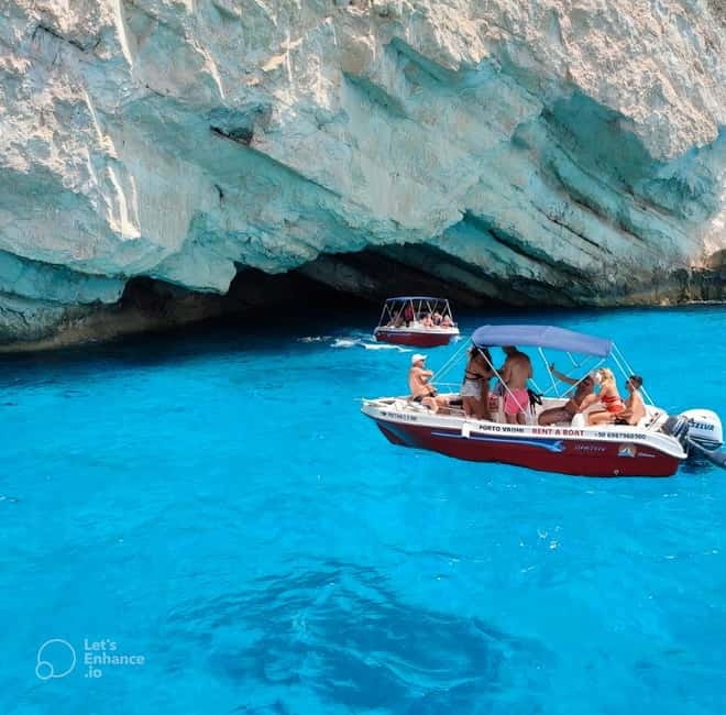 Zakynthos: Shipwreck & Caves Private Boat Tour with Skipper - Starting beneath the yellow umbrella in Porto Vromi