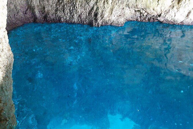 Zakynthos Small Group Tour Shipwreck bay Blue Caves by Land & Sea - Sfogio Beach Swimming Time: Short Water Fun at the End