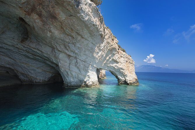 Zakynthos Smugglers Cove Full-Day Cruise - North-coast landmarks: Skinari, the turtle-shaped island, and the Blue Caves approach