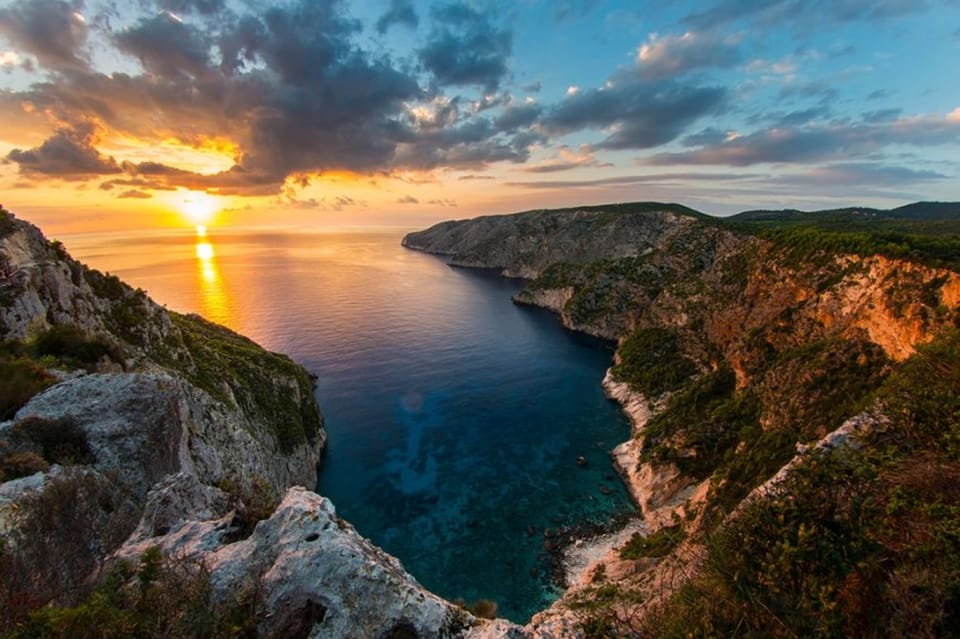 Zakynthos Sunset Tour to Kampi with Greek Night! - Pickup from Zakynthos Town and the resort areas