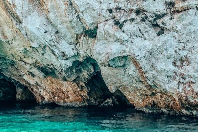 Zakynthos West Coast Tour and Navagio Bay - Porto Vromi to Shipwreck Bay: your first cliff-and-cave minutes